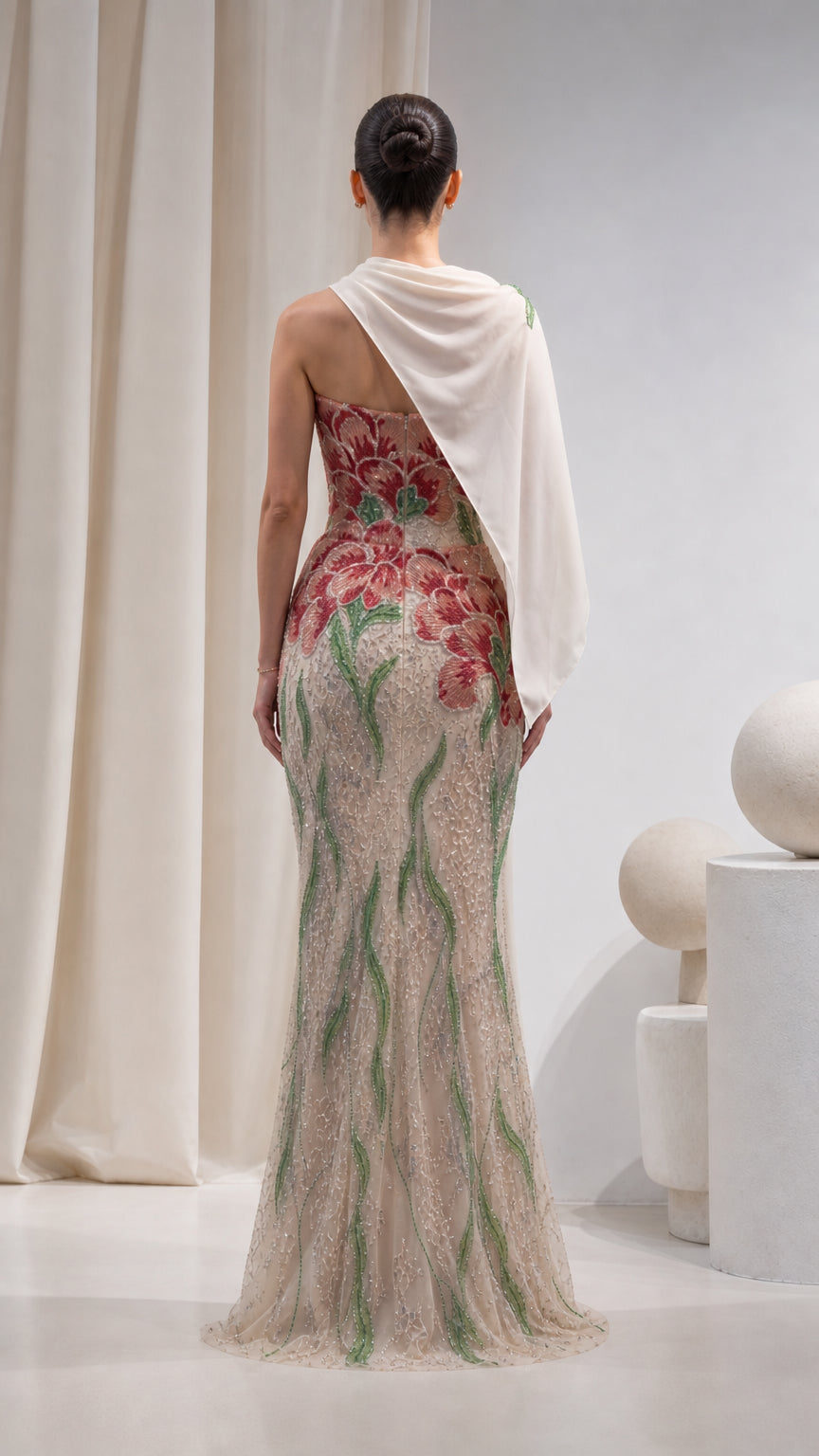Back view of Champagne strapless evening dress with asymmetrical draped scarf cape