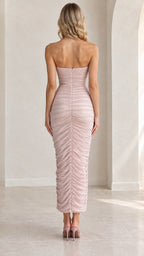Back view of strapless sweetheart ruched maxi dress in blush pink