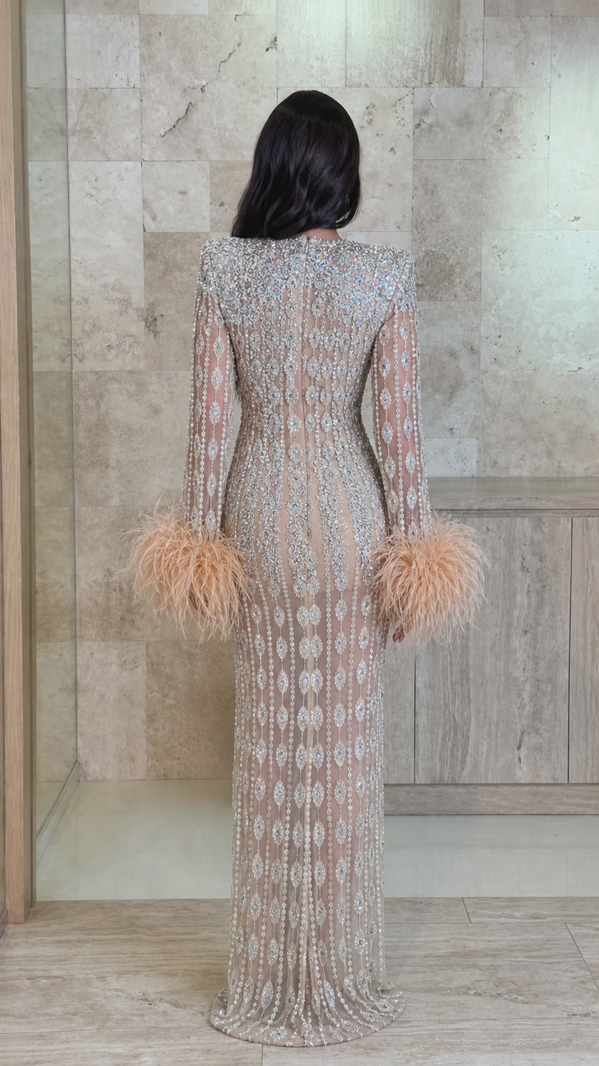 Back view of Champagne embellished high-neck maxi dress