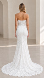 Back view of white lace mermaid bridal gown showing sheer corset back and extended train