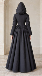 Back full-length view of black hooded maxi gown coat with hood raised
