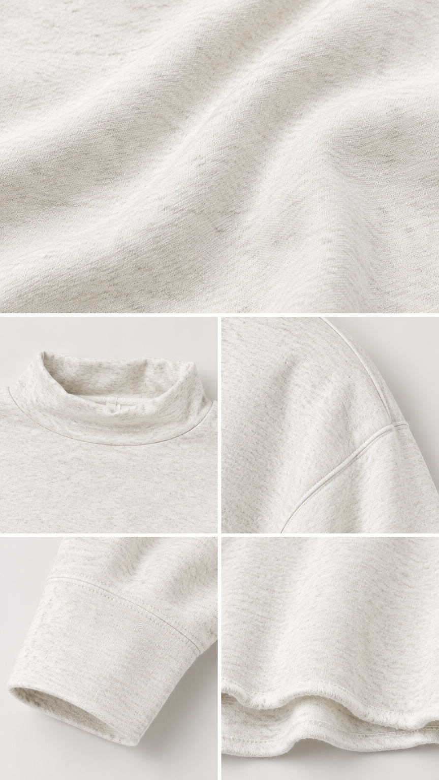 Close-up details of soft heathered fabric, mock neckline, shoulder seams, and cuffs