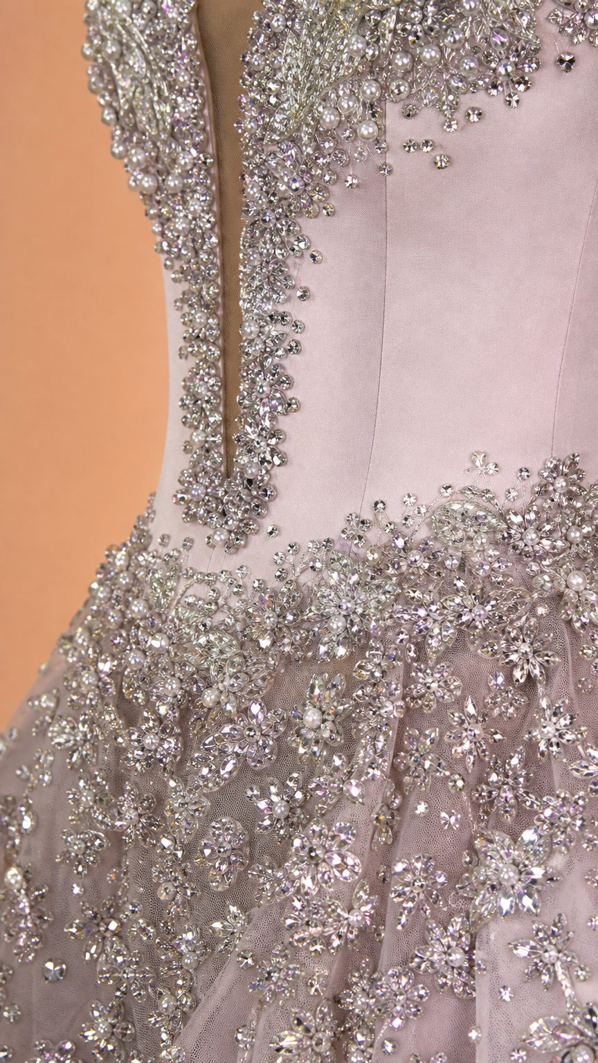 Close-up detail of silver rhinestone and crystal embroidery on gown bodice