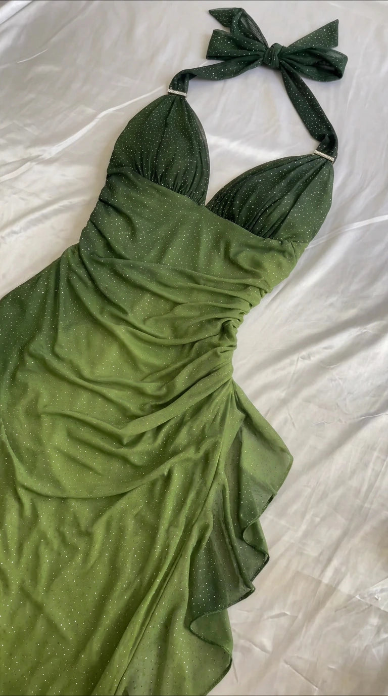 Flat lay close-up of olive green shimmering ruched halter dress