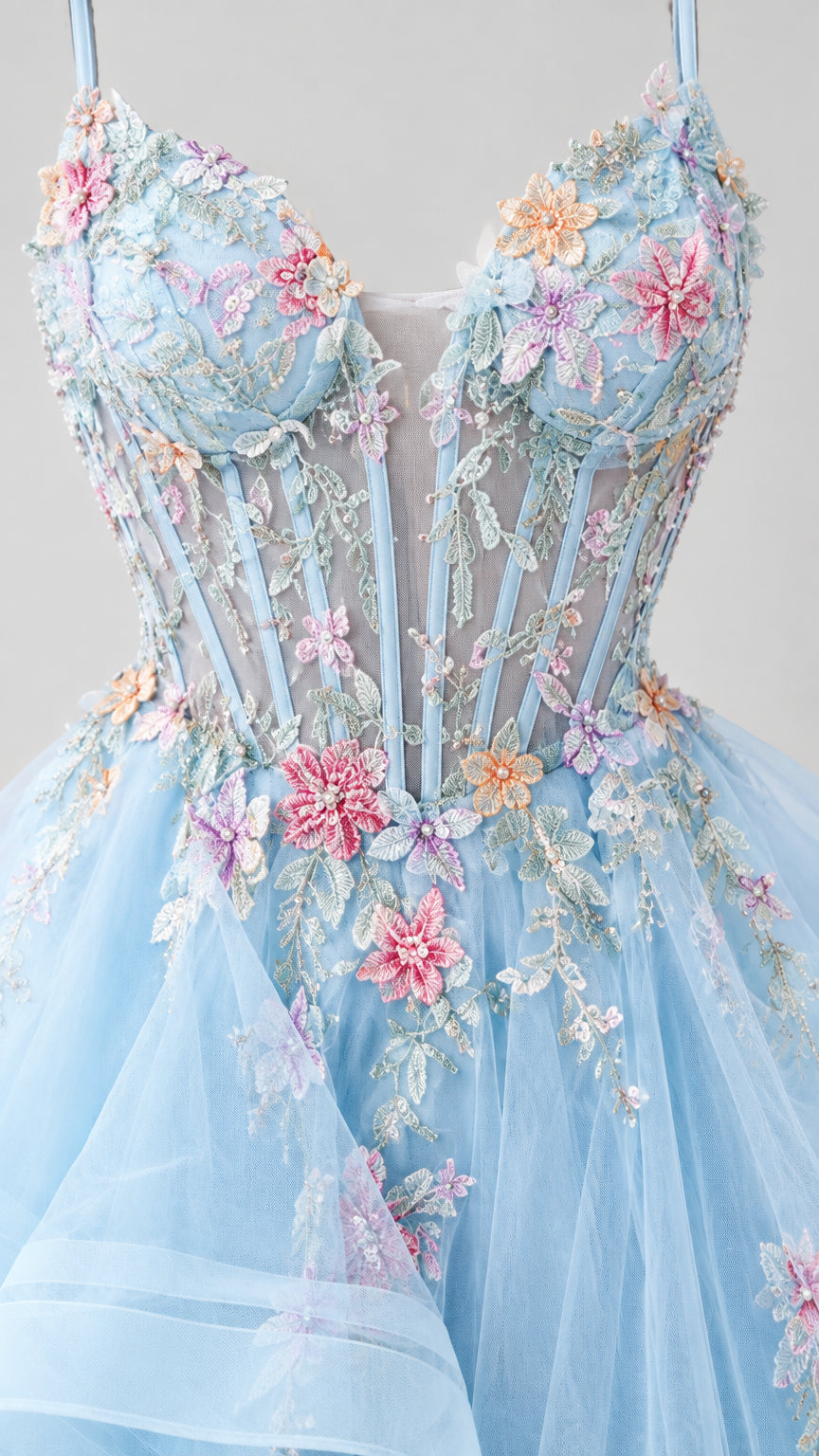 Close-up detail of sheer boned corset bodice with multi-color floral lace appliqués