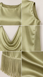 Close-up details of sage green satin fabric, neckline, cowl back drape, and fringe hem