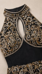 Close-up detail of high beaded collar and teardrop keyhole neckline
