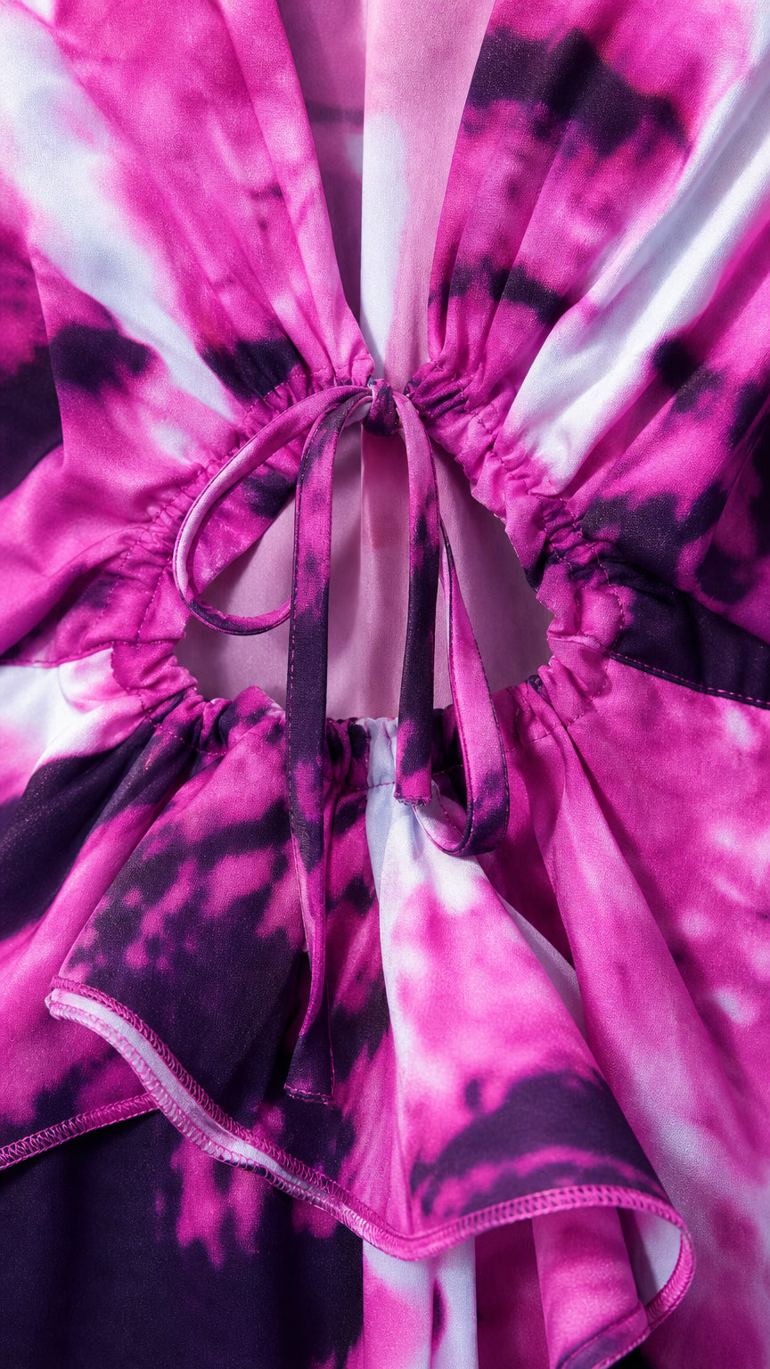 Close-up detail of front cutout and drawstring tie on Fuchsia tie-dye dress
