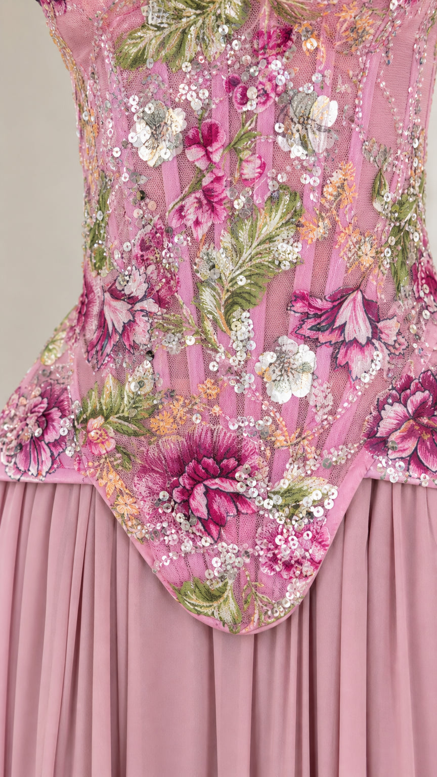 Close-up of intricate floral sequin embroidery on structured corset bodice