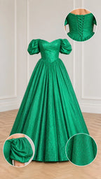 Flat lay of emerald green glitter ball gown with detail insets of lace-up back, sleeve, and fabric
