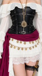 Close up of structured black underbust corset with front zipper, buckle details, and metallic coin belt