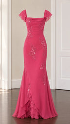 Full-length studio view of fuchsia flutter sleeve evening gown on mannequin