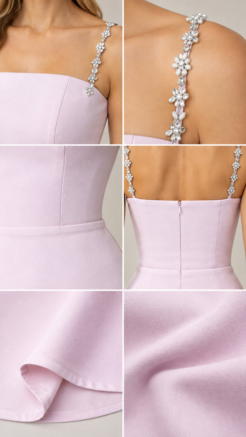 Close-up details of floral rhinestone strap, straight neckline, back zip, and fabric texture