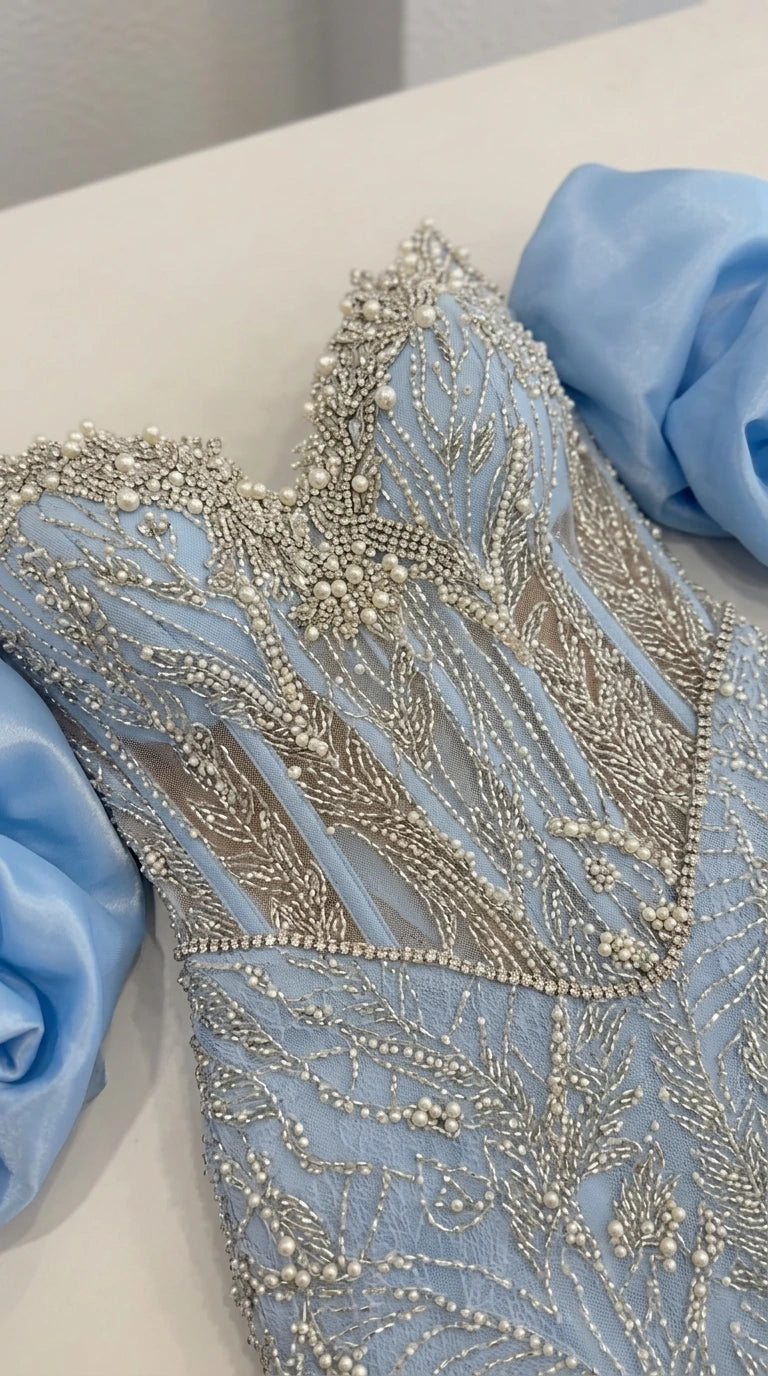Close-up detail of sheer boned corset bodice with pearl and crystal embroidery