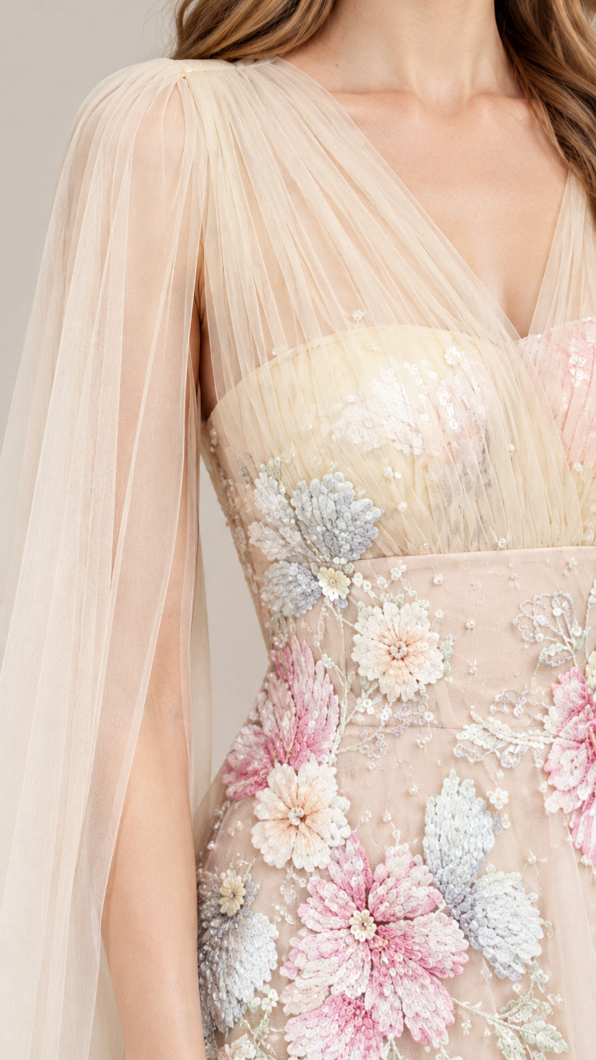 Close-up detail of pastel floral embroidery and pleated tulle bodice