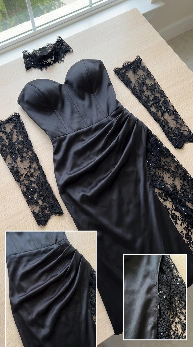 Flat lay view of black satin gown with lace gloves, choker, and fabric close-ups