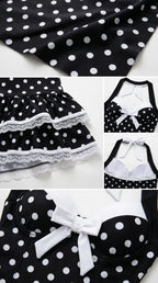 Close-up details of black polka dot fabric, lace-trimmed ruffles, and sweetheart bow neckline