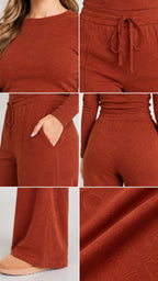 Close-up details of rust lounge set showing crewneck, drawstring waist, pocket, and fabric texture