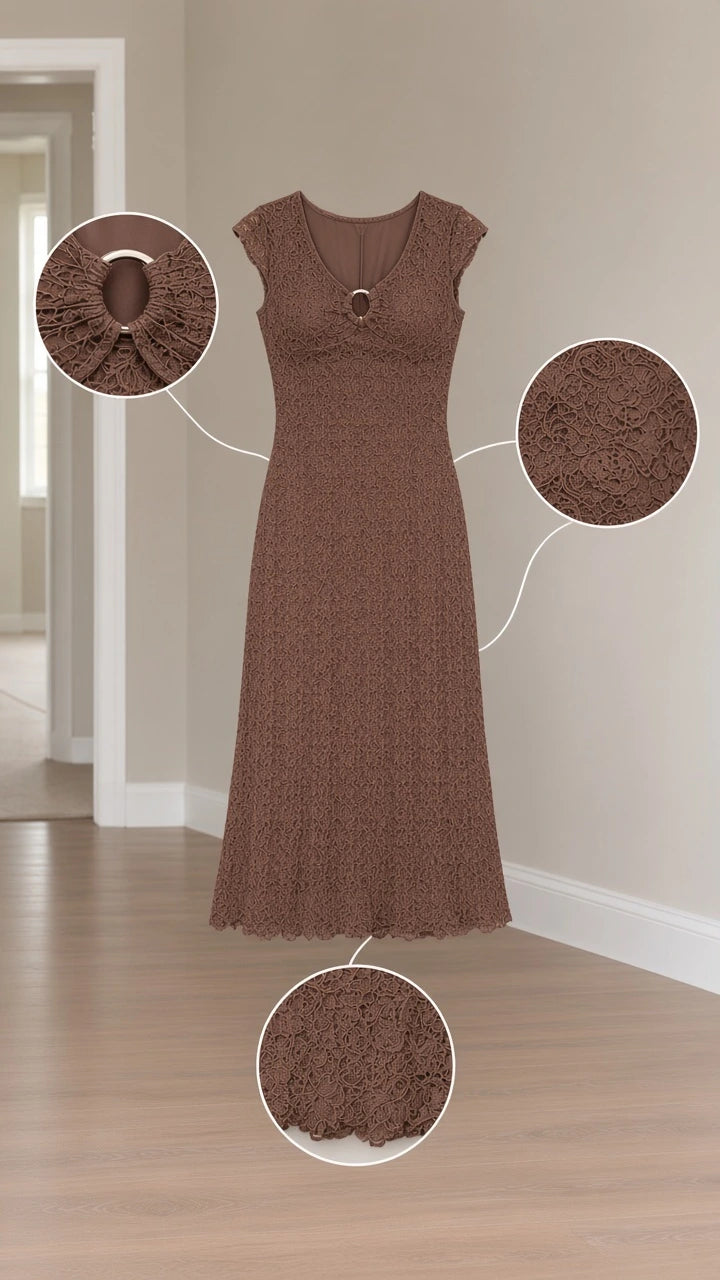 Detailed flat lay of brown textured midi dress showing neckline ring cutout and crinkle fabric