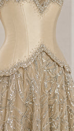 Close-up detail of beaded sweetheart neckline and basque waist on Champagne corset gown