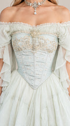 Close-up detail of embroidered and beaded basque corset bodice on mint green gown