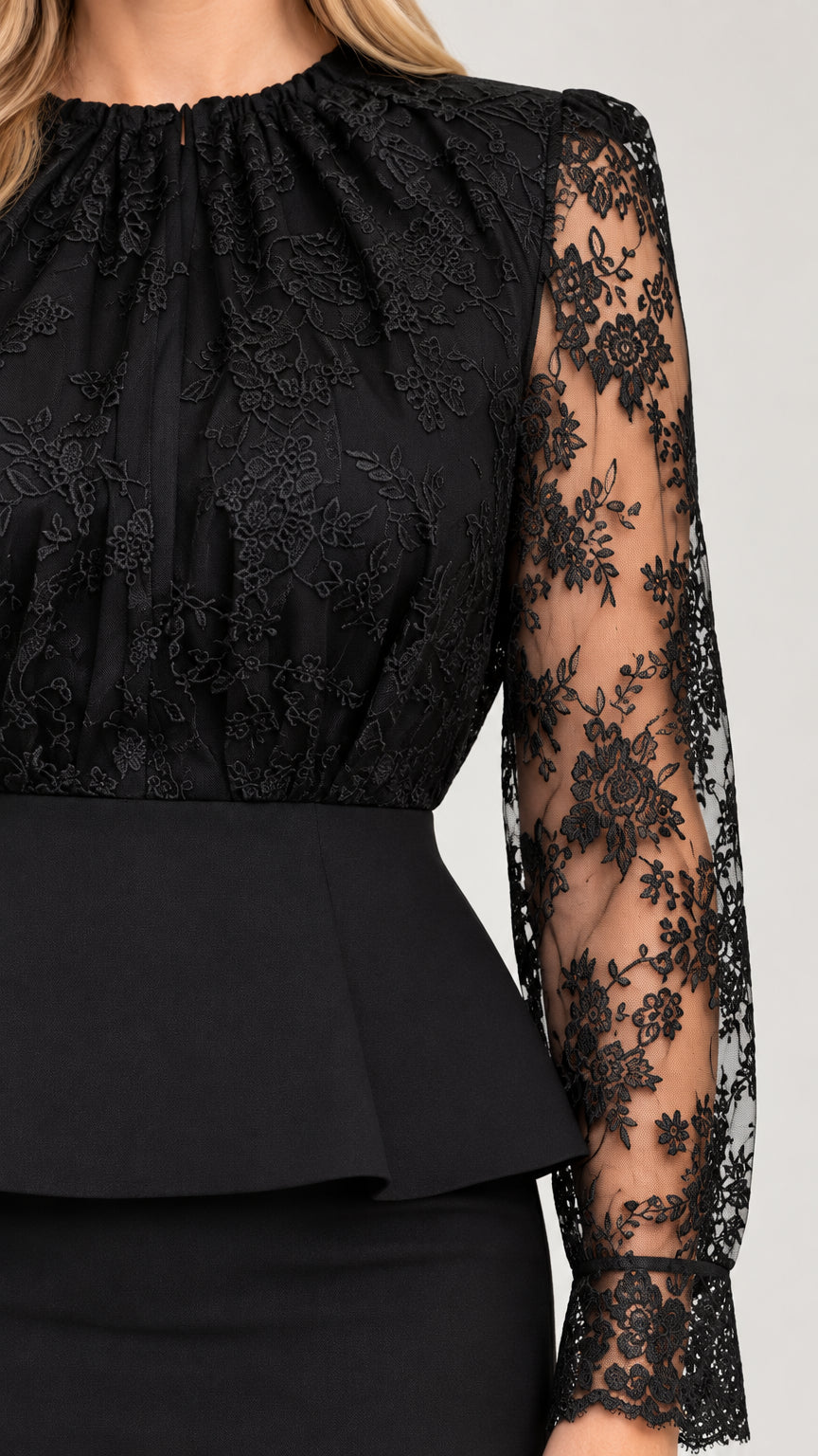 Close-up detail of gathered neckline, floral lace bodice, and peplum waist