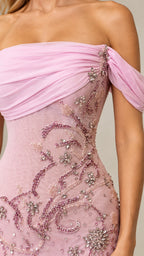 Close-up detail of dusty rose draped bodice and intricate floral beadwork