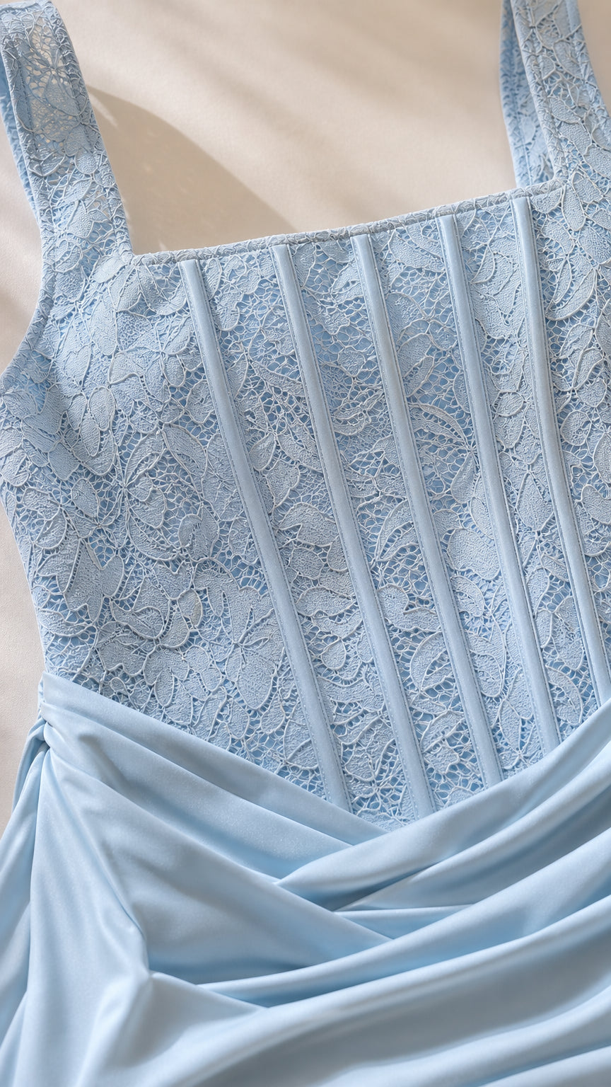 Close-up of light blue floral lace corset bodice and gathered waist