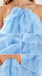 Close-up details of light blue ruffle texture, halter neckline, and back zipper