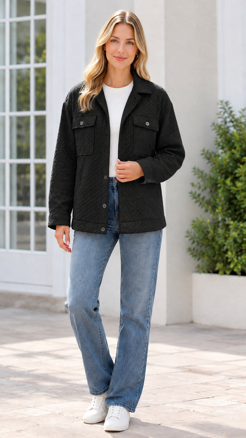 Model wearing black textured button-front shirt jacket