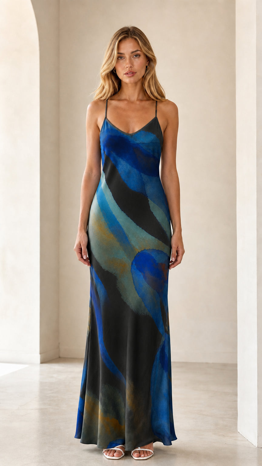 Model wearing midnight blue and black abstract print satin maxi slip dress