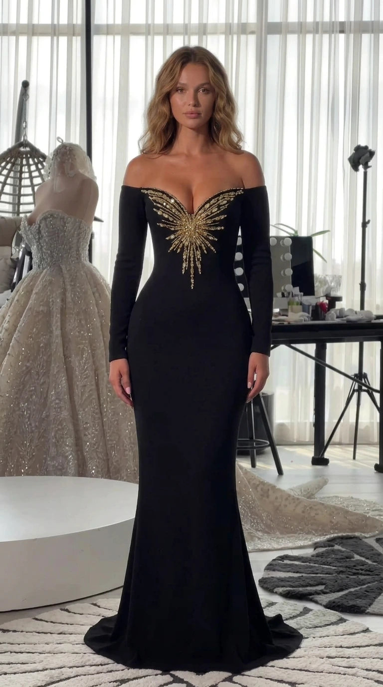 Front view of model wearing black off-the-shoulder beaded evening gown