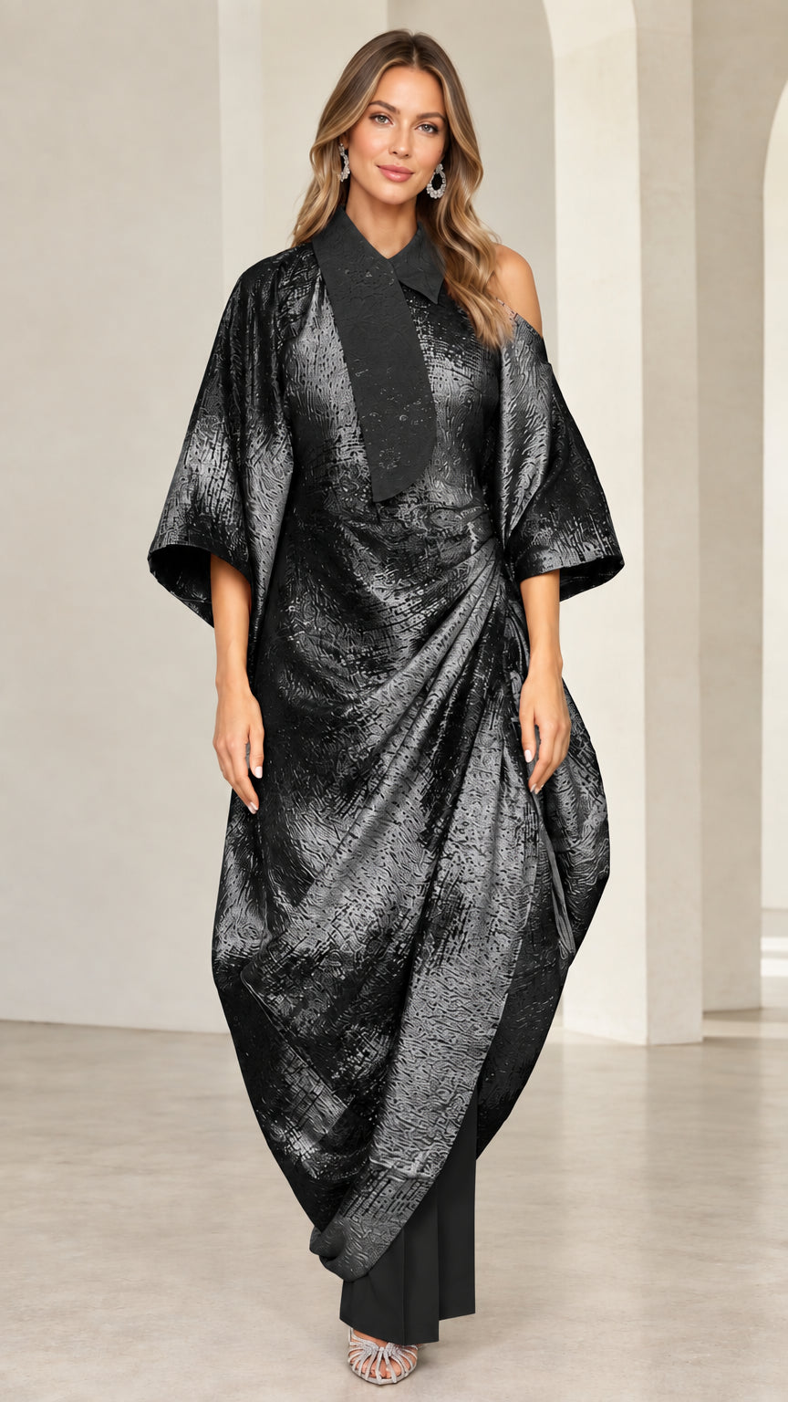 Front view of black metallic shimmer draped kaftan tunic and trouser set