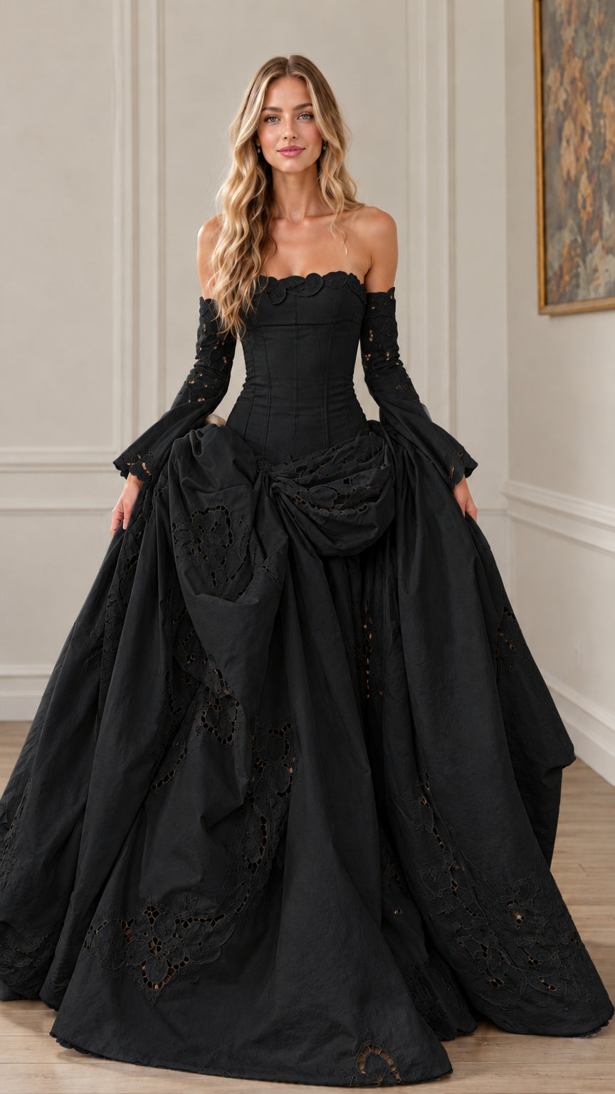 Front view of black off-the-shoulder corset ball gown with draped skirt and flared sleeves