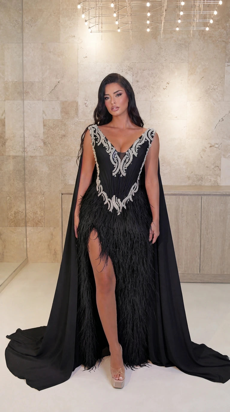 Model wearing Black embellished V-neck feather cape evening gown with high slit