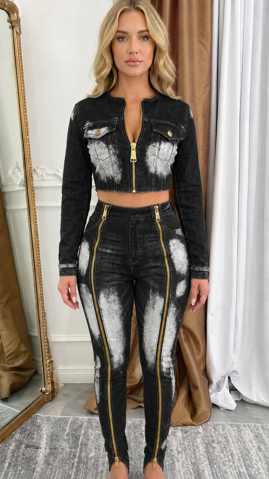 Model wearing black acid wash cropped denim jacket and front zip skinny pants set