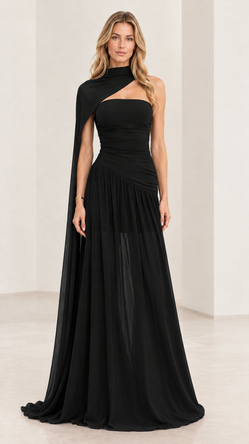 Black strapless ruched maxi evening dress with draped asymmetric capelet