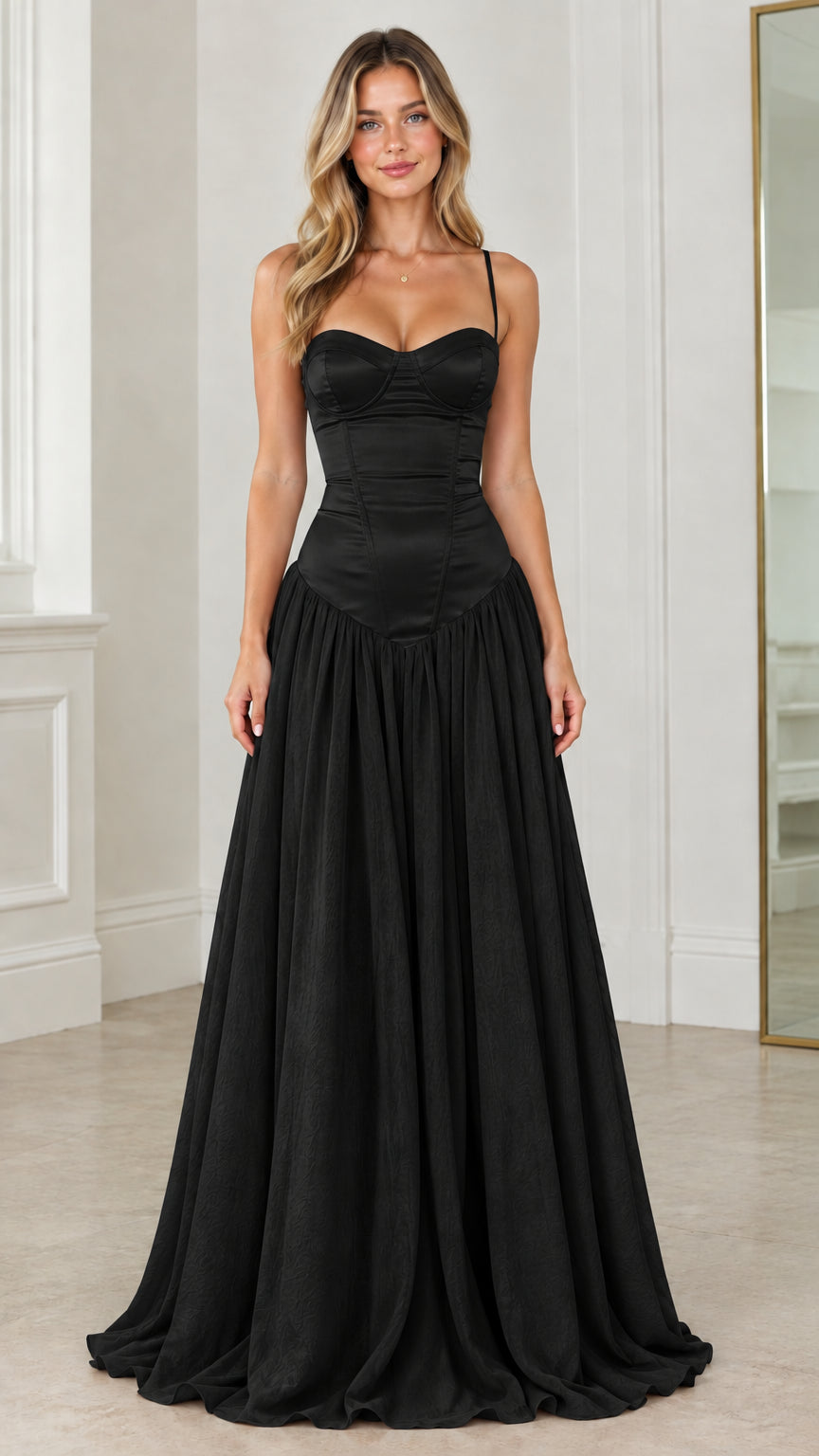 Front view of model wearing black corset basque waist maxi dress