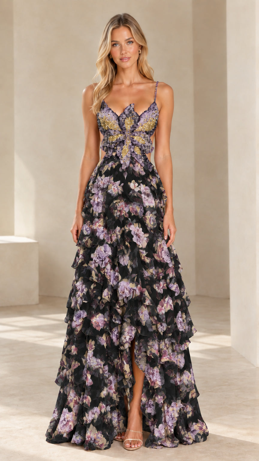 Front view of model wearing black floral beaded butterfly bodice tiered ruffle evening gown