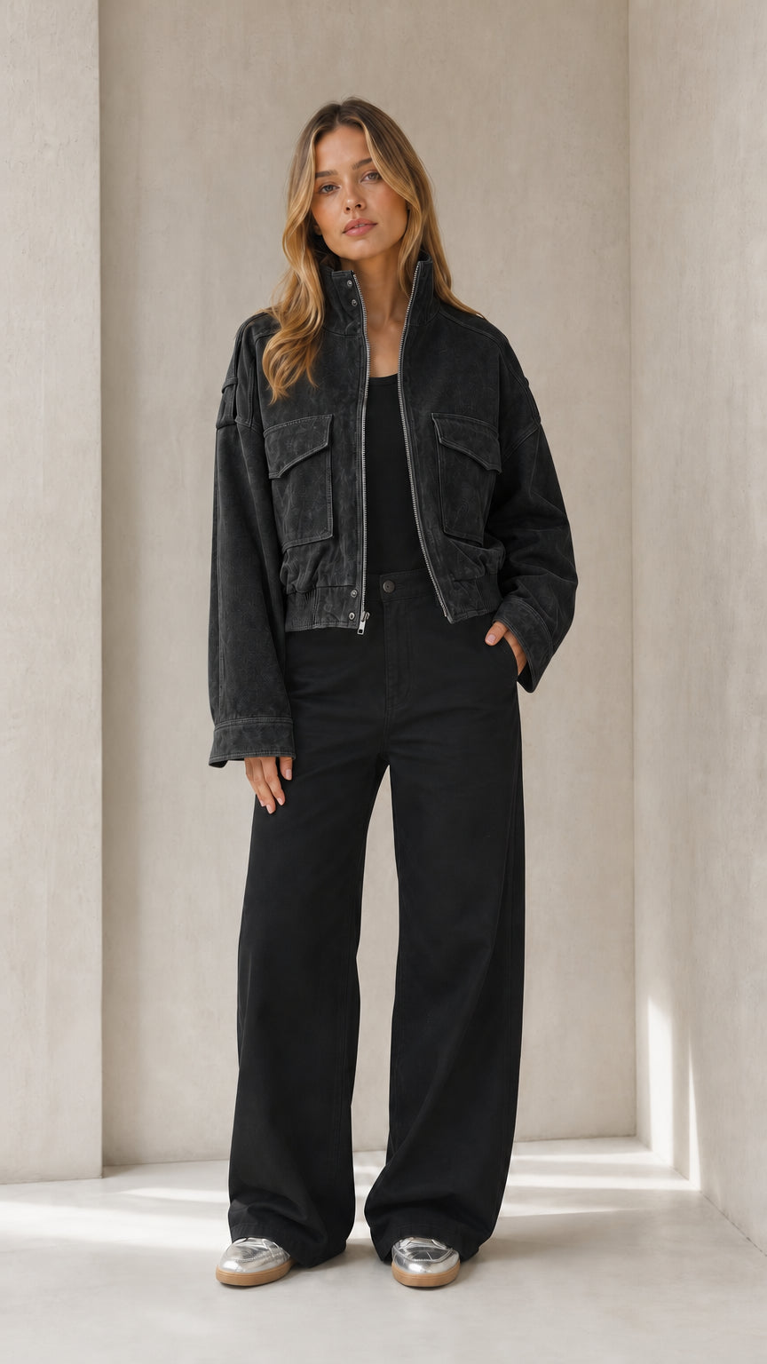 Women's washed black cropped faux suede utility jacket styled with black trousers