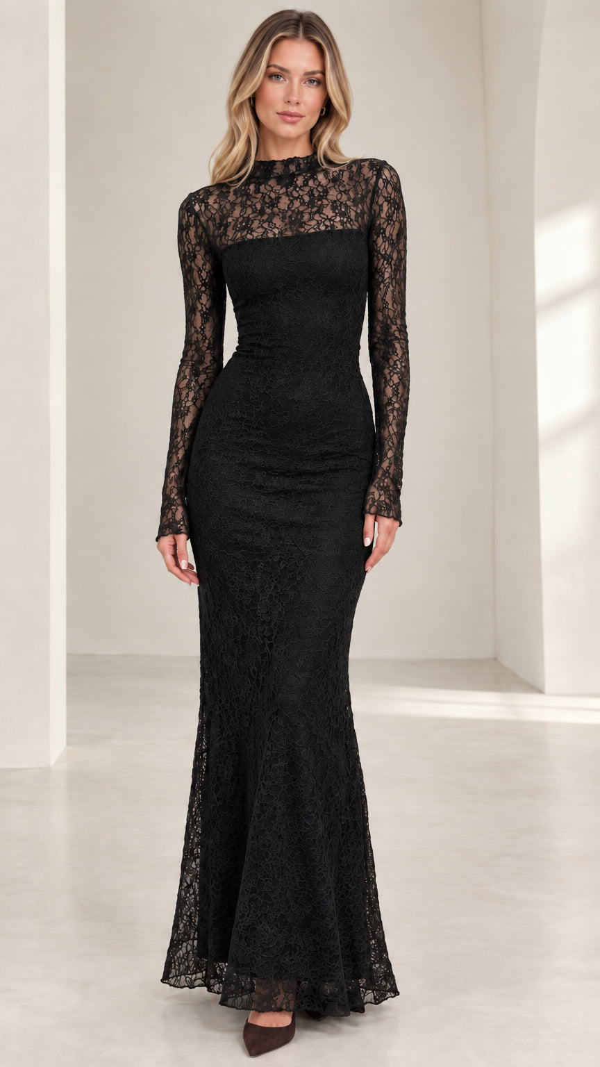 Front view of woman wearing black high neck long sleeve lace maxi formal dress