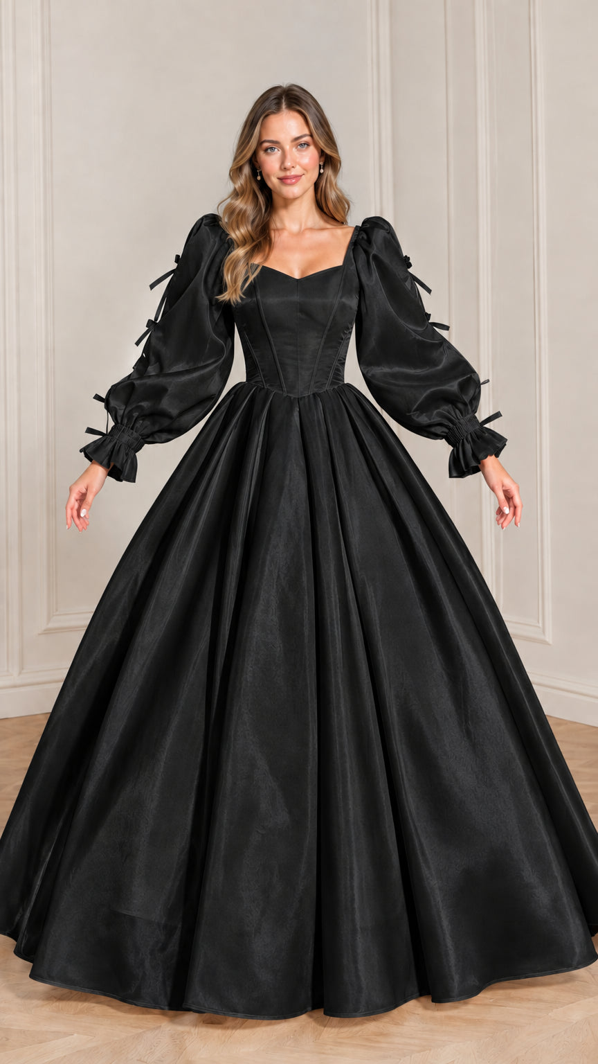 Full-length front view of black sweetheart corset ball gown with bow sleeves
