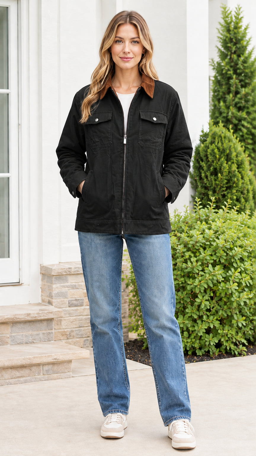 Front view of model wearing the black canvas utility jacket with brown corduroy collar