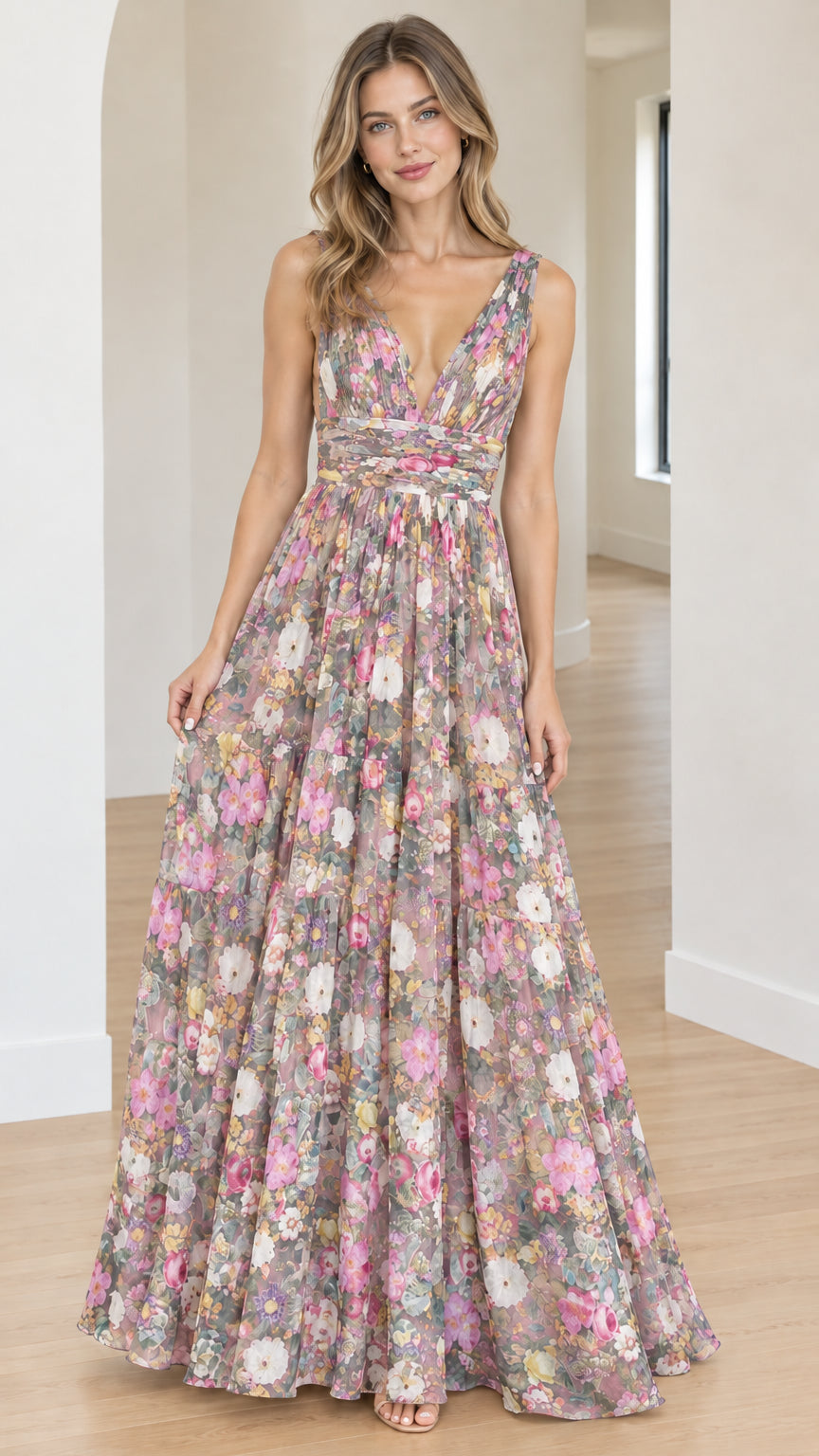 Model wearing a soft pink floral pleated V-neck A-line maxi dress