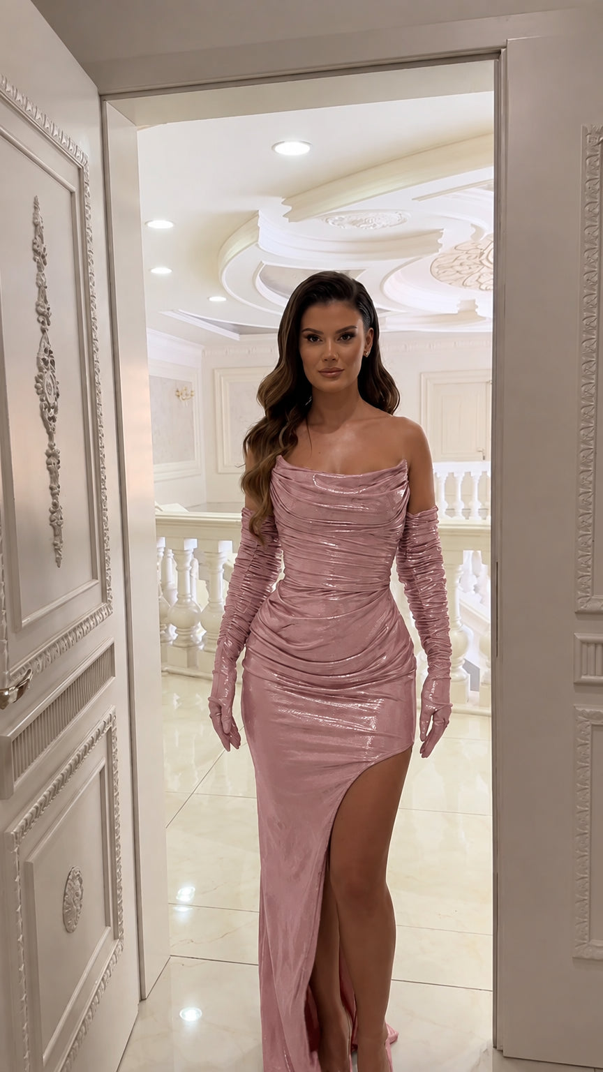 Model wearing blush pink metallic strapless ruched corset maxi skirt set with gloves