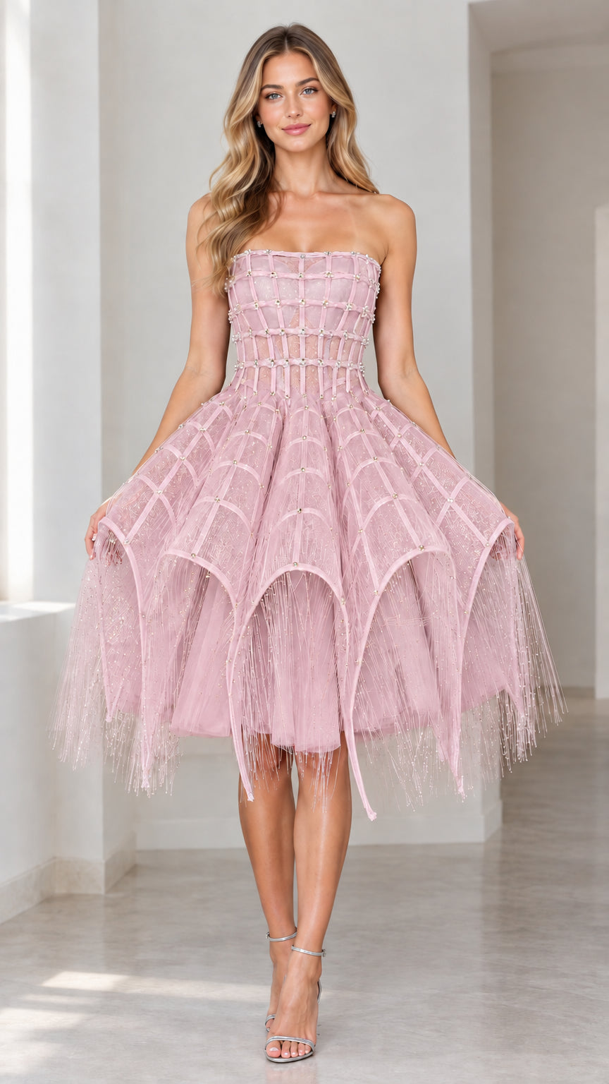 Front view of dusty pink strapless embellished corset cocktail dress with tiered fringed skirt