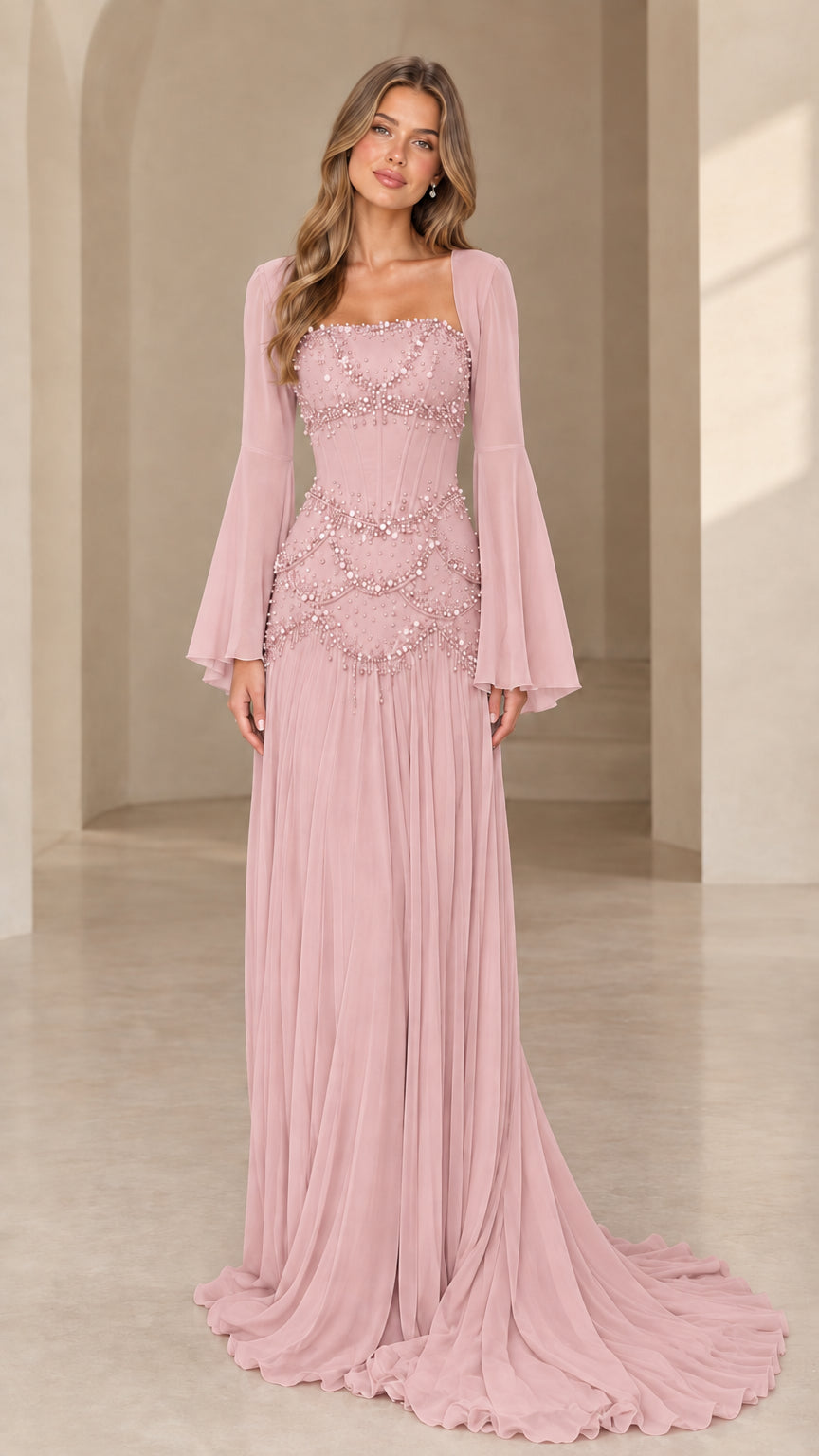 Dusty pink beaded evening gown with long bell sleeves and flowing skirt