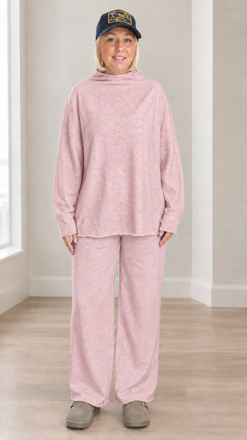 Front view of model wearing dusty pink mock neck sweatshirt and wide leg lounge set