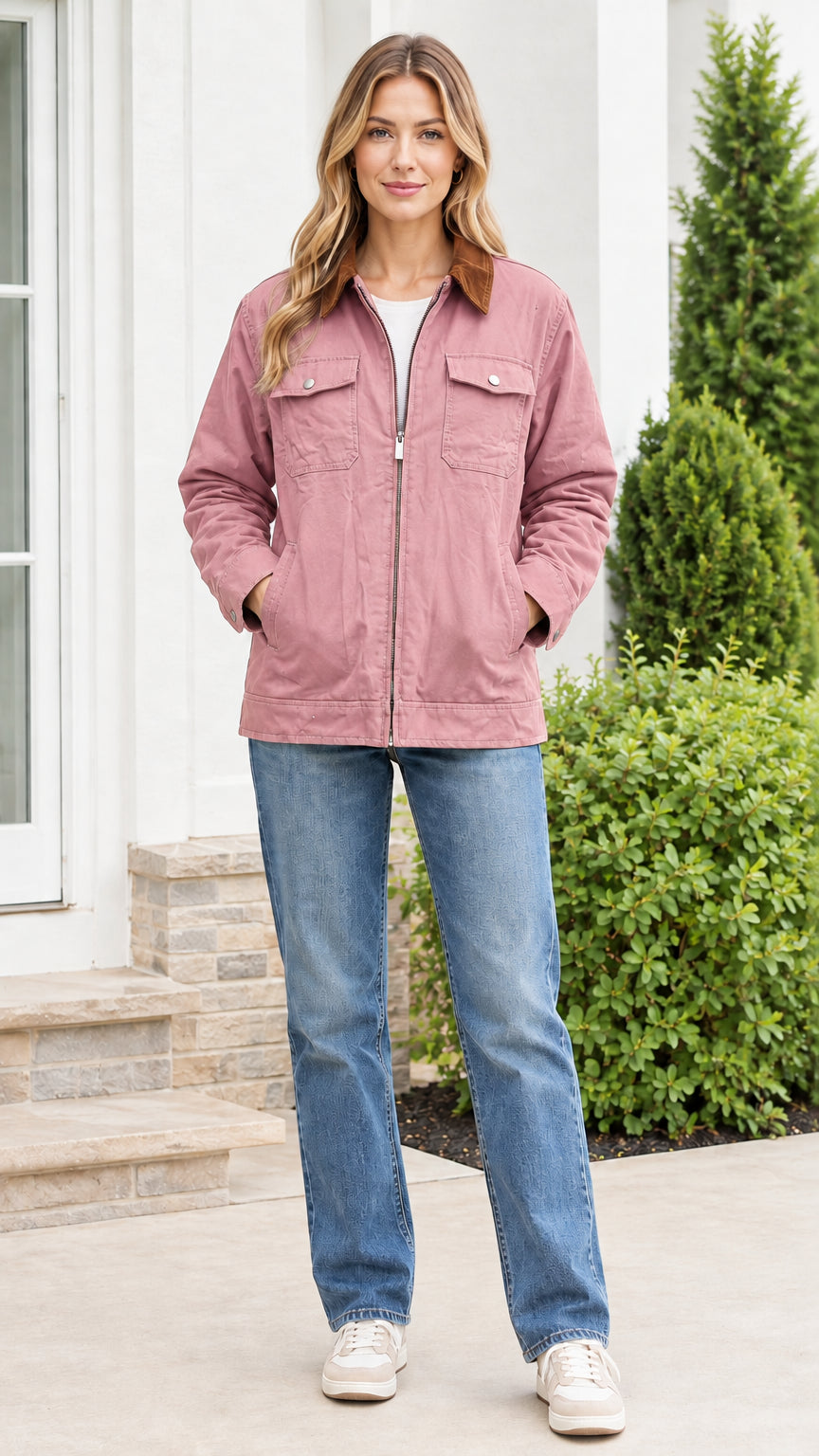 Front view of model wearing the dusty pink canvas utility jacket with brown corduroy collar