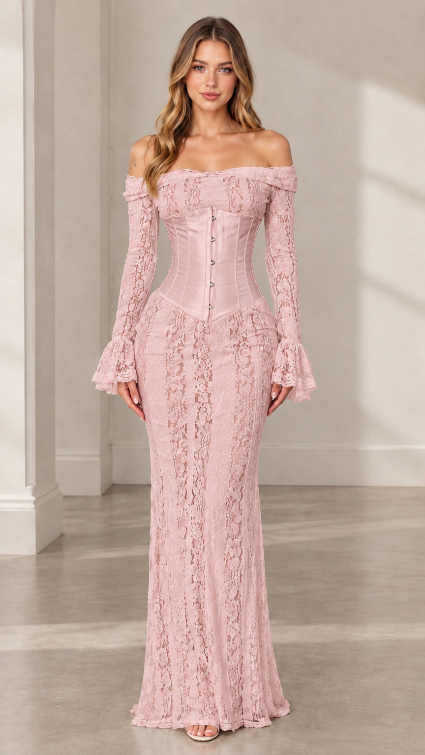 Woman wearing dusty pink off-the-shoulder floral lace corset maxi dress